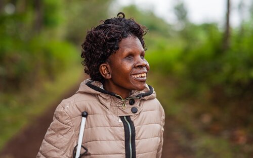 A woman with visual impairment smiling